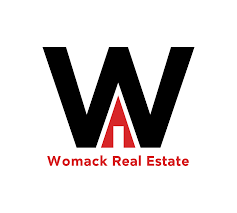 Womack Real Estate logo